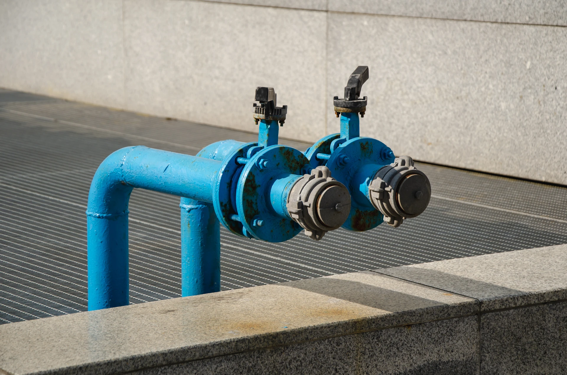 closeup-blue-water-pipes-with-fittings-handles-fire-hydrant-pipes-with-valve